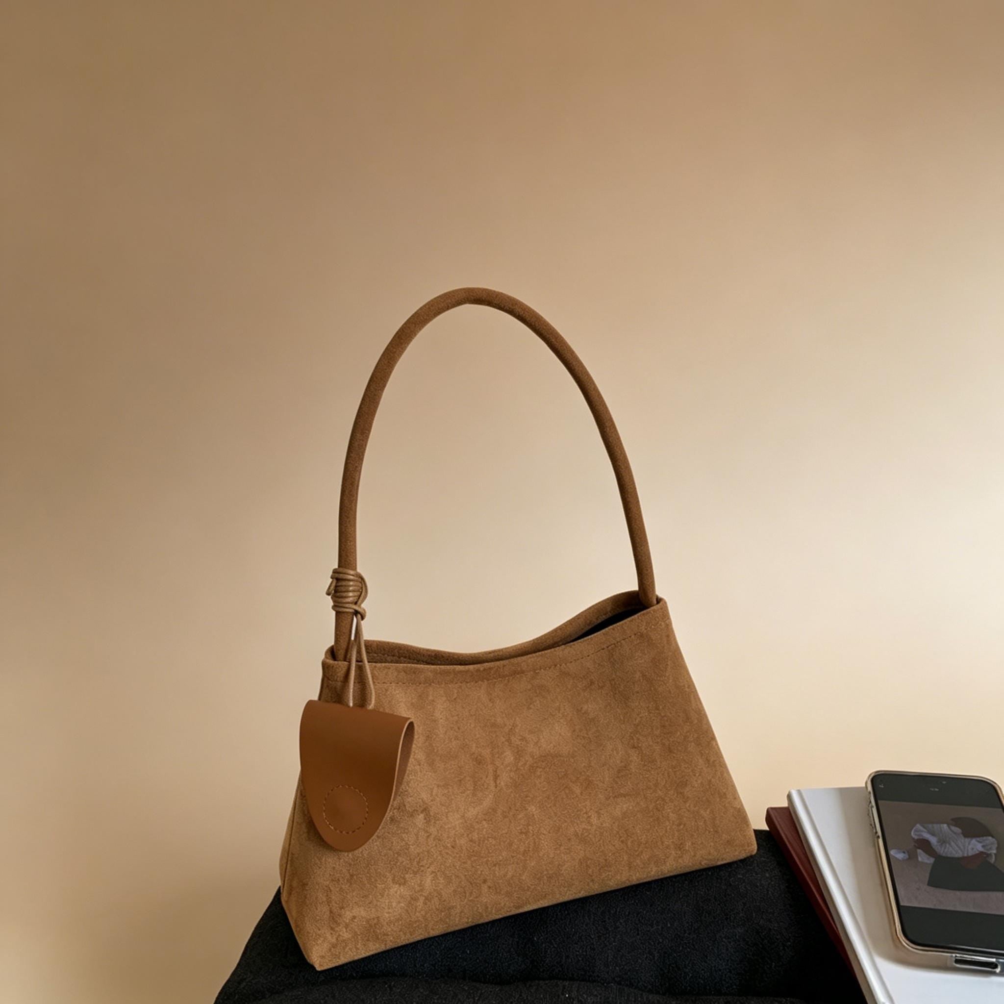 Sac à bandoulière hobo en daim vintage