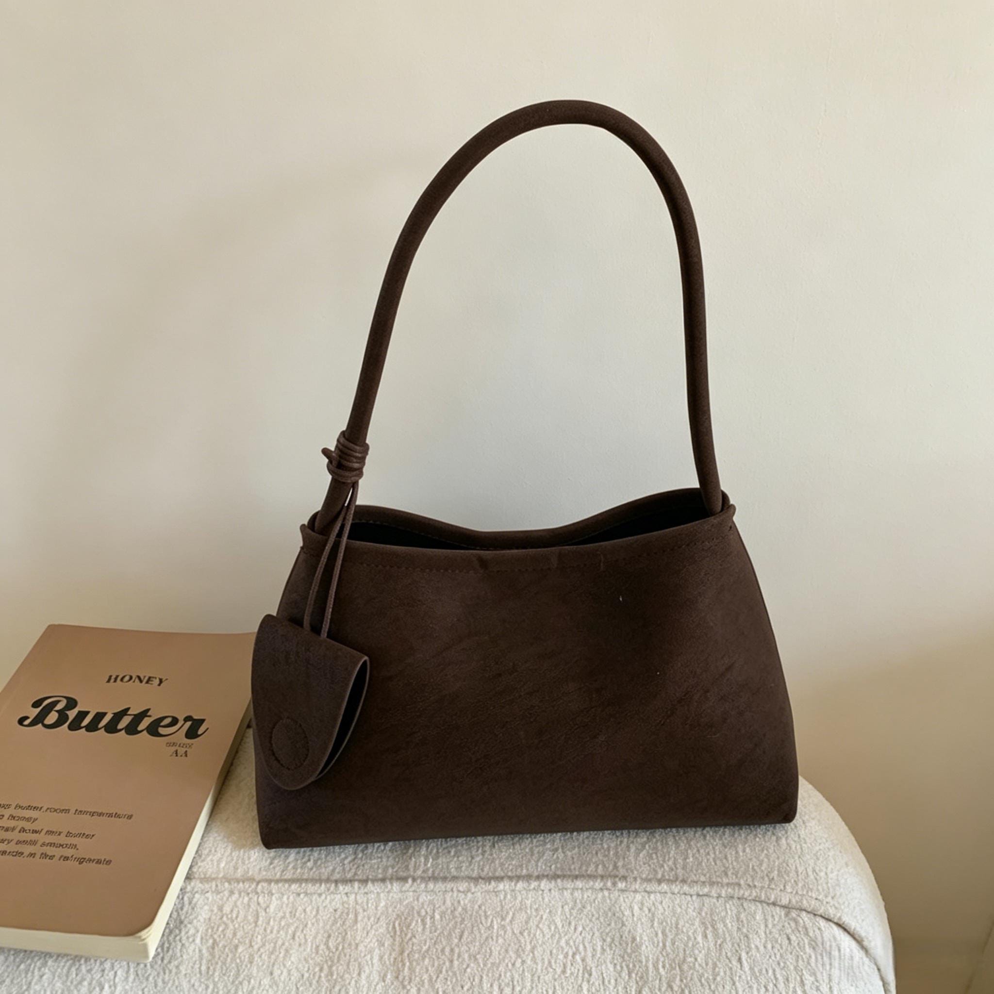 Sac à bandoulière hobo en daim vintage